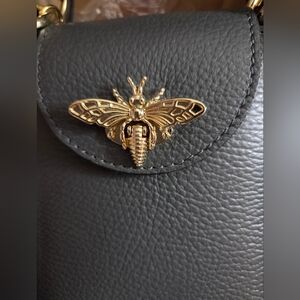 Black Leather Bag with Gold Insect Detail